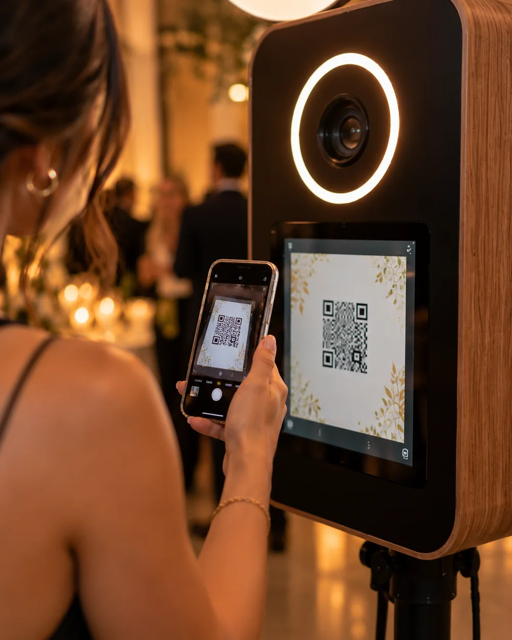 Guest scanning a photo booth QR code